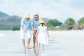 Happy family summer seaÃÂ  beach vacation. Asia youngÃÂ people lifestyle travel enjoy fun and relax in holiday. Royalty Free Stock Photo